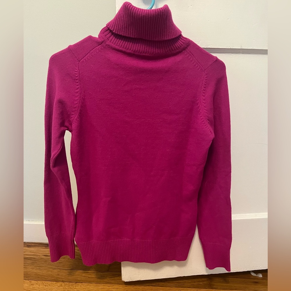 Pink turtleneck sweater